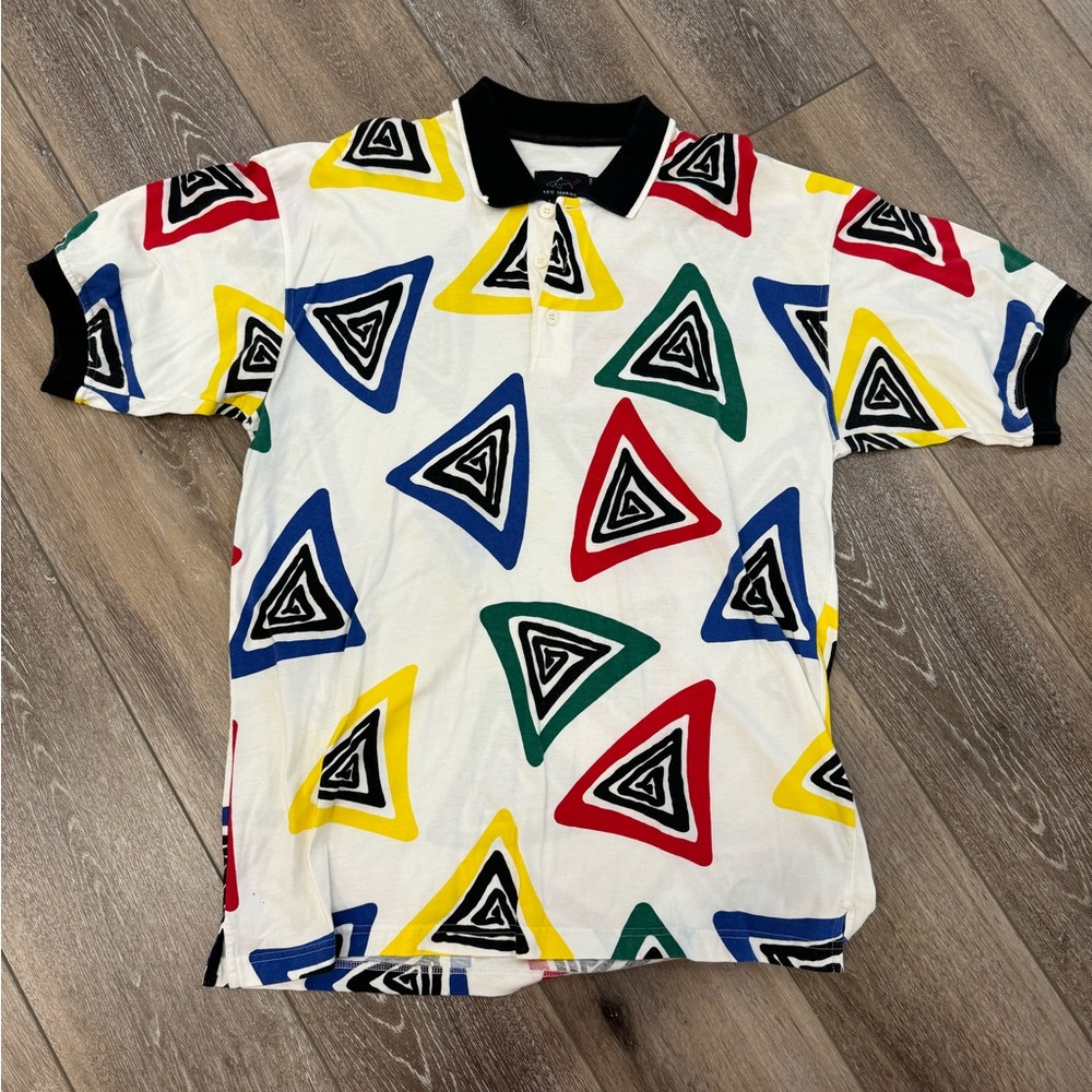 VTG Greg Norman golf polo with abstract triangles